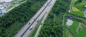 Modern highway in the forest aerial view